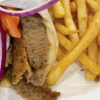 Gyros Sandwich · Yia Yia's favorite. Gyros served on pita bread with fresh tomato, onions and homemade tzatzi...