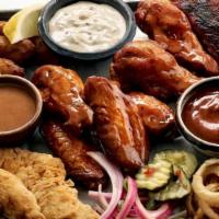 Sampler Platter · Boneless chicken wings, loaded tots, mozzarella sticks, frickles. Includes: marinara sauce, ...