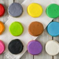 Frosted Sugar Dozen · A dozen of our deliciously frosted sugar cookies in our case colors. Specific colors can not...