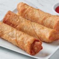 Chicken Egg Rolls · A mixture of shredded vegetables and chicken in an over sized wonton skin and cooked to gold...