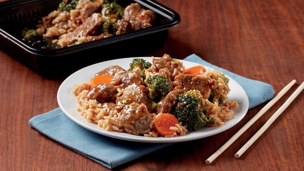 Beef With Broccoli · Prepared with marinated beef, broccoli and carrots in a light brown sauce. 580 cal./1170 cal.