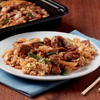 Mongolian Beef · Marinated sliced beef paired with yellow onions and scallions in a sweet, savory Mongolian s...