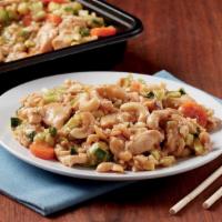 Cashew Chicken  · Tender breast chicken with carrots, celery and zucchini sautéed in a light brown sauce. Topp...