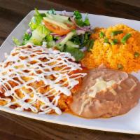 Red Enchiladas. · 3 Corn tortillas filled with chicken tinga and topped with salsa, melted chihuahua cheese, a...
