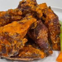 Spicy Buffalo Wings · This sauce is sure to please all classic Buffalo wing fans. Roasted Fresno peppers, red wine...