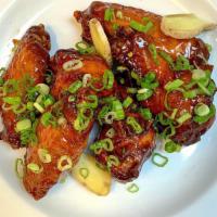 Chinese Garlic Wings · Pluck’d Sweet and Sour Sauce, red pepper flakes and garlic make a delicious glaze for our Ch...