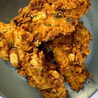Chicken Tenders (2) · Free-range chicken tenders, double breaded and fried to golden perfection. Served with side ...