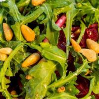 Roasted Beet Salad · Beets, Goat cheese, Red Onions, Arugula, Pine Nuts and Lemon Vinaigrette. **This Salad conta...