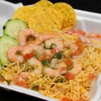 Botana Prime · Noddle topped with camarones en aguachile with Nacho chips, pico de gallo and cucumber