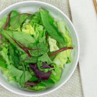 House Salad · Iceberg lettuce with ginger dressing.