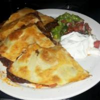Bbq Pork Quesadilla · BBQ pork, shredded melted cheese, onions, and BBQ sauce in a crispy flour tortilla and serve...