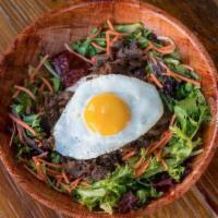 Gogi Bowl · Rice, Salad Mix, Fried Egg*, Choice of Protein, Carrots, Green Onion, Sesame Oil, and spicy ...