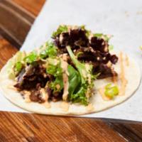 Side Taco · Choice of protein. Korean Salad Mix, Green Onion, Seoul Sauce, crushed Sesame Seeds and a we...