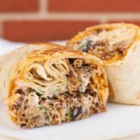 Classic Carnitas Burrito · Slow-roasted pork shoulder, fried cheese, rice*, pinto beans, white onion, cilantro, spicy s...