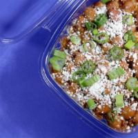 Rice & Beans · Seasoned fried rice* and pinto beans, cotija, and green onion. *contains dairy