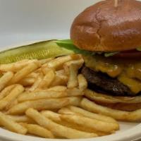 Classic Cheeseburger · 8 ounce. Sirloin beef patty, topped with cheddar cheese, lettuce, tomato and onion.