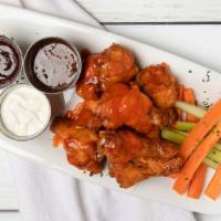 Wings (8) · Jumbo naked wings, choose your sauce for the toss: buffalo, BBQ, sweet and spicy Asian cilan...