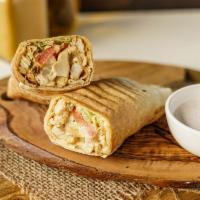 Succulent Chicken · Sliced chicken breast, crispy lettuce, tomatoes, pickles and creamy garlic sauce all wrapped...