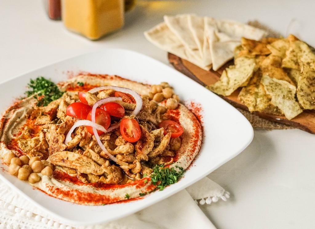 Heavenly Hummus Plate · Shawarma served with hummus and pita