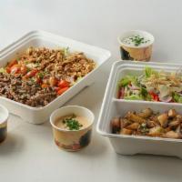 “Family” Shawarma Platter (Serves 5) · Includes: Chicken, Lamb, or Beef. 2 sides and pita bread.