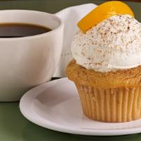 Peach Cobbler · Vanilla streusel cake, filled with peach puree, topped with homemade whipped cream and a pea...
