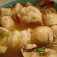 Tom Yum · Thai's favorite soup with mushrooms, green onions, lime juice, lemongrass and Thai chili pas...