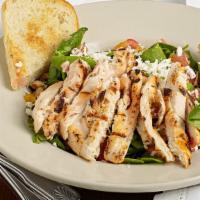 Manny'S Salad · Grilled chicken on a bed of tomato, walnuts, cranberries, apricot, with a raspberry vinaigre...