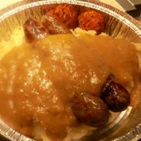 Bangers And Mash · Huge portion of  mash potato's, with 2 Large  Irish Bangers on top. Smothered in Guinness Gr...