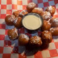 12 Doughnut Holes · A Dozen fried with cinnamon Toast Crunch Dust, or Powdered Sugar. Served with our home made ...