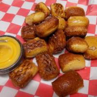 Fried Pretzel Bites · 12 pieces, fried up! With ranch or Nacho cheese.
