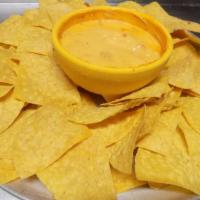 Chips & Queso · We deep fry our own chips! Hot or Mild! Just specify in your comments