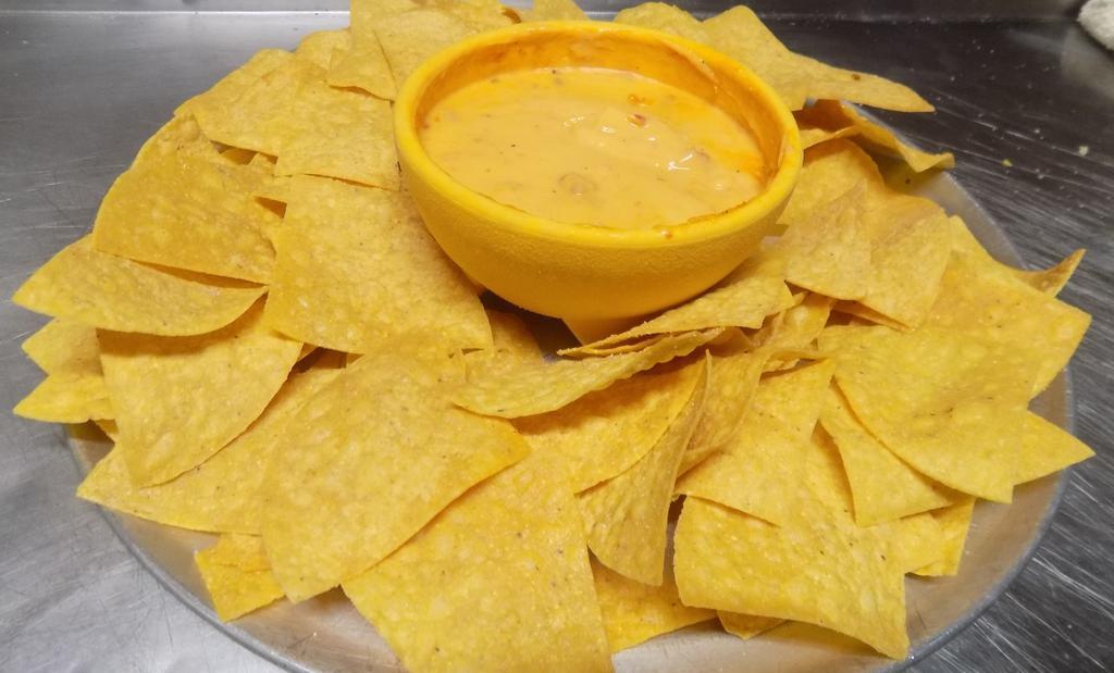 Chips & Queso · We deep fry our own chips! Hot or Mild! Just specify in your comments