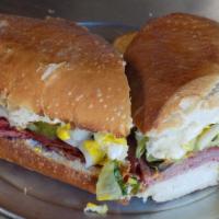 The Shamrock · Loaded with corned beef, sauerkraut and cheese. on Toasted French Bread!