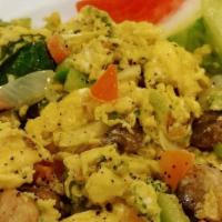 Veggie Scrambler · Broccoli, tomatoes, green peppers, onions, spinach, and mushrooms.