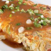 Roast Pork Egg Foo Young · Served with white rice.