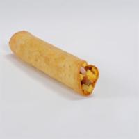 Breakfast Taquito · Scrambled eggs, diced sausage, diced ham, crumbled bacon, spicy cheese sauce and crumbled me...