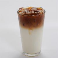 Macchiato · Monin® caramel syrup and steamed milk topped with espresso, garnished with froth and caramel...