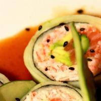 Summer · Crab mix, salmon, asparagus, and avocado wrapped with cucumber, topped with icon garlicky sa...