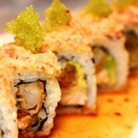 Samurai · Salmon, avocado, and coconut shrimp roll top with avocado, spicy crab mix, and wasabi tobiko...