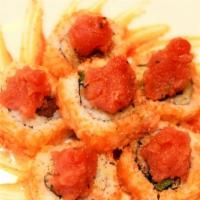 911 Roll · Tuna, jalapeno, and tempura crispy roll with masago on the outside topped with choice of spi...