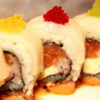 Disco · Salmon, avocado, crab, and cream cheese roll, topped with escolar, served on cafe icon’s sig...