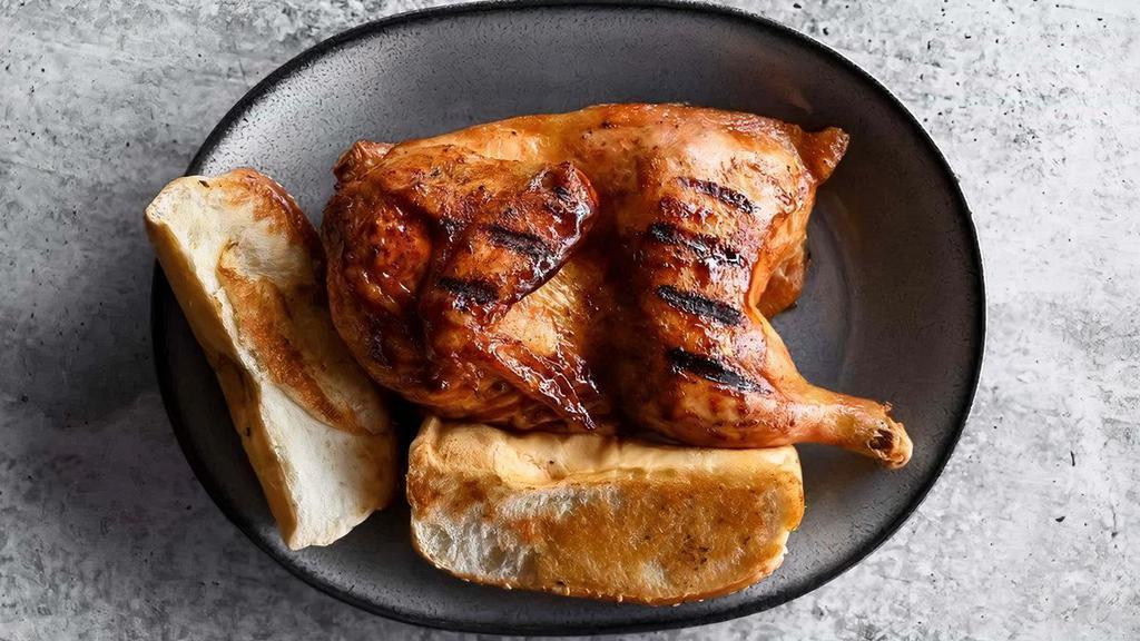 Half Chicken · Bone-in chicken, smoked over local hickory and served with Texas toast
