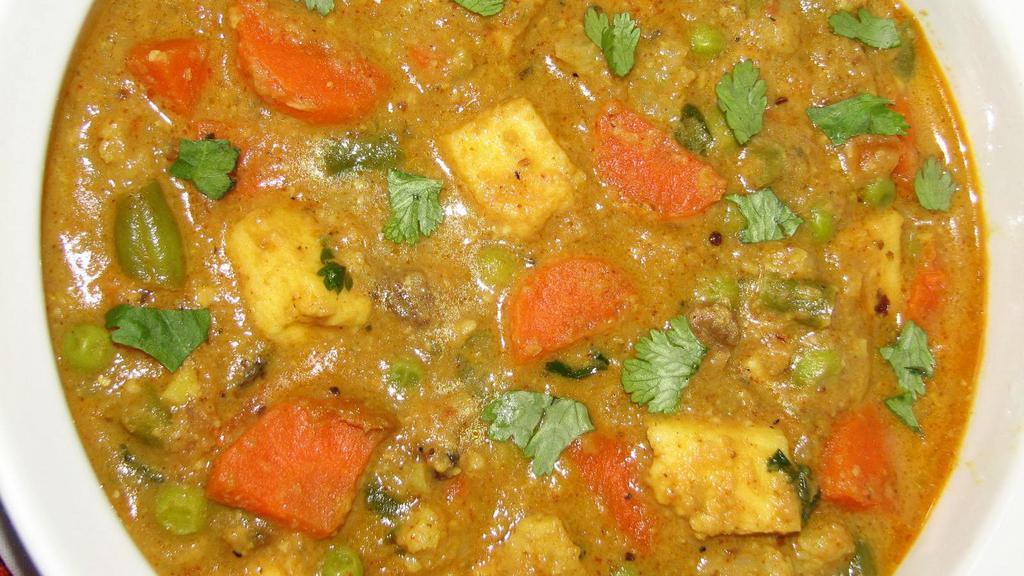 Shahi Korma Mix Veg · Mix Veg. cooked in a yogurt curry sauce with spices.