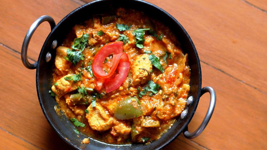 Kadai · Onions & bell peppers Cubes in brown curry sauce with Kadai Masala