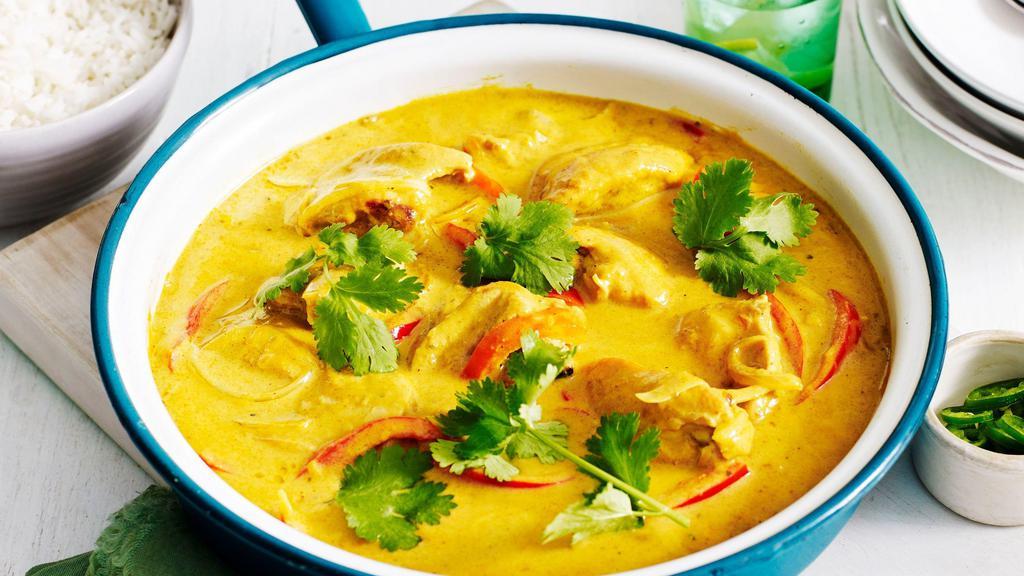 Mango · Mango curry sauce &  mild spices cooked in Your Choice of add-on
