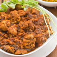 Chettinadu · Cubes of Protein cooked in a spicy coconut sauce with spices.