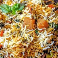 Dum Biryani Vegetable · Traditional Hyderabadi celebration meal-Mixed vegetables cooked with spices and basmati rice.