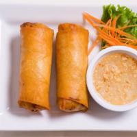 Spring Rolls (Vegetable) · Shredded cabbage, carrots and bean thread noodles in an egg roll shell. Served with our hous...