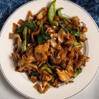 Drunken Noodle · Gluten-free and spicy dish. Sautéed thick fresh rice noodles with fresh basil leaves and gre...