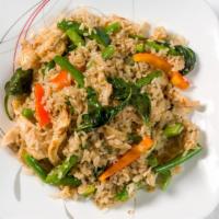 Kow Pad Gra Prow · Gluten-free and spicy dish. Fried rice with basil leaves, string beans, and green peppers.
